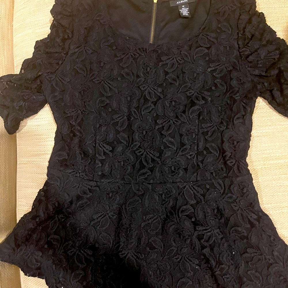 Super cute and girly lace peplum top ! Worn once